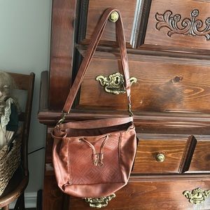 Ladies purse with adjustable straps